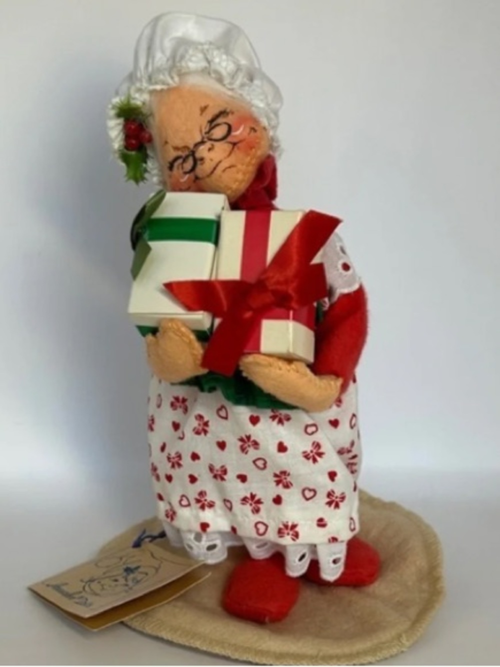 Holiday Mrs. Claus Figurine in Red & White Holding Presents